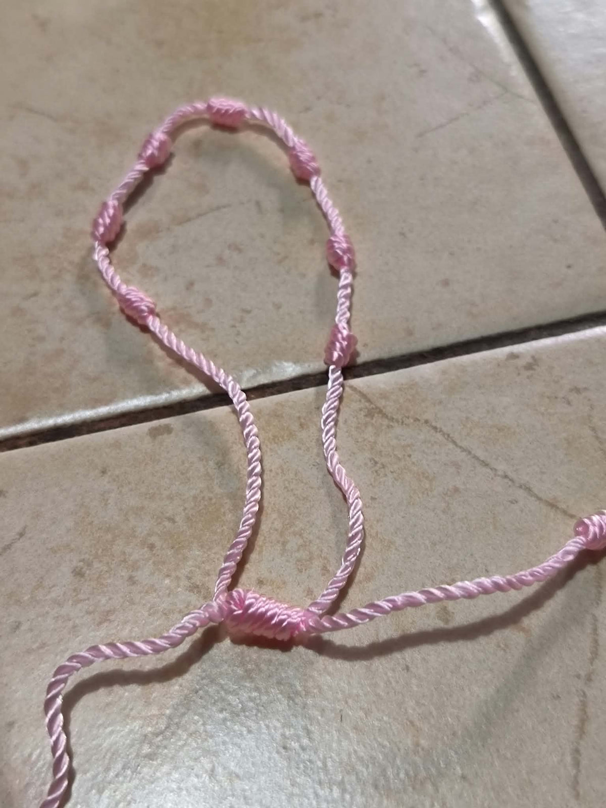 Lot un bracelet et un petit porte-clé